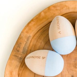 Baby Blue Egg Shakers sitting on a timber board