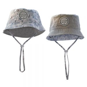 Reversible grey bucket hats with snowy mountain print and textured grey